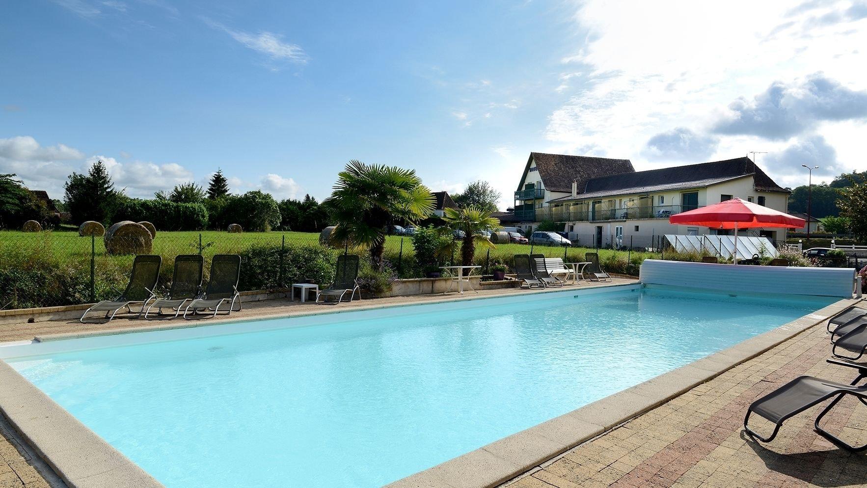 Vista Piscina Auberge du Relais