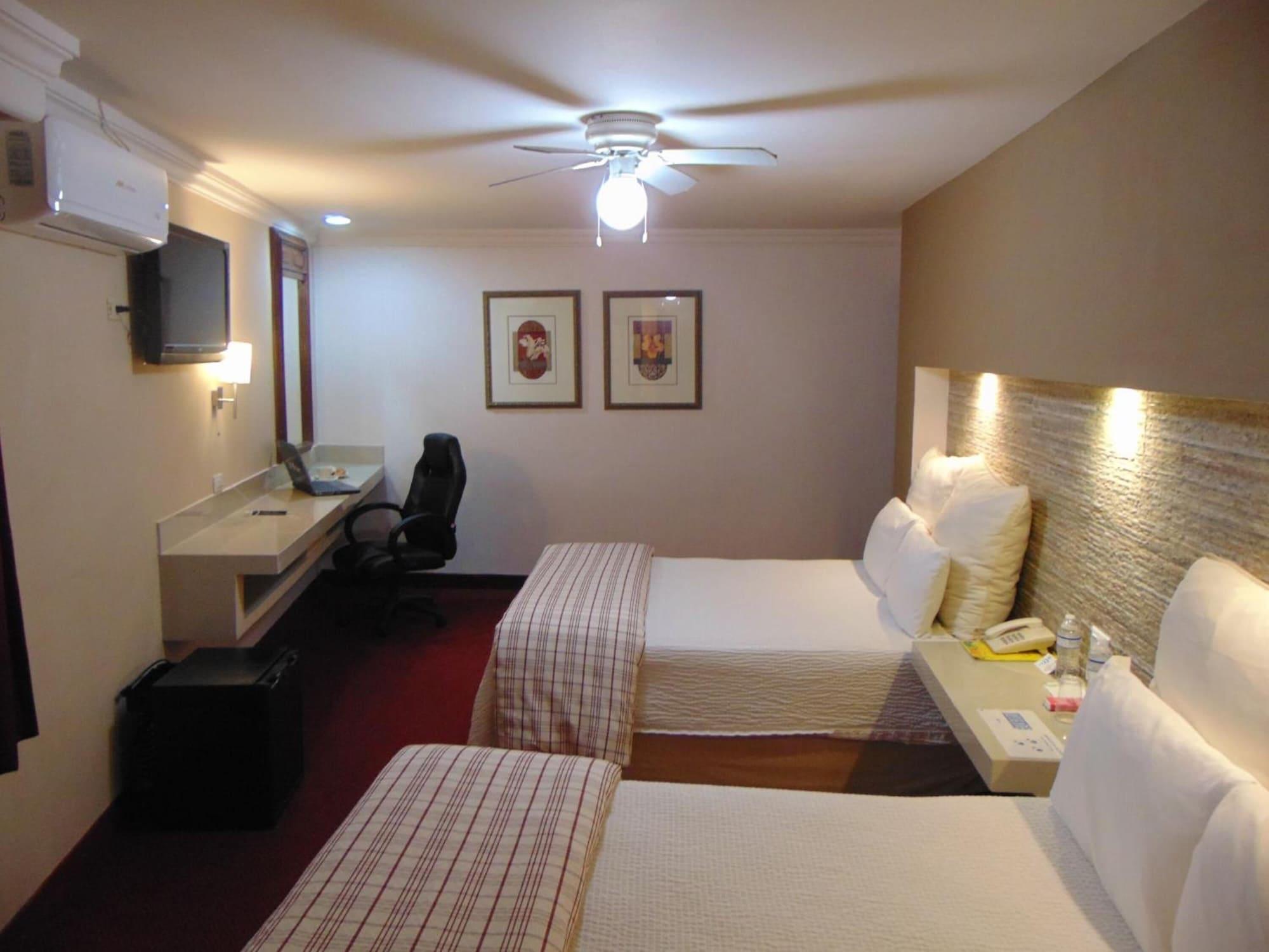 Habitación Hotel Royal Inn