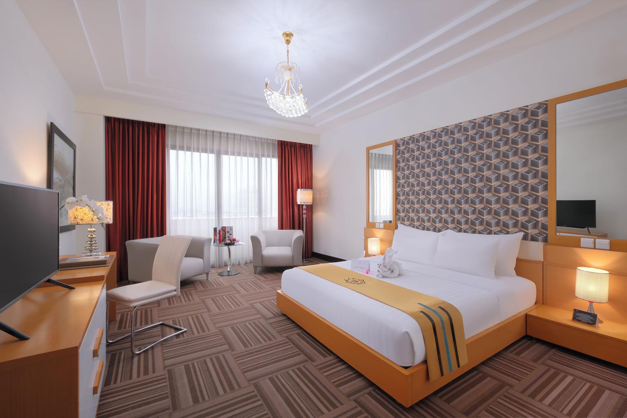 Habitación Merlynn Park Hotel