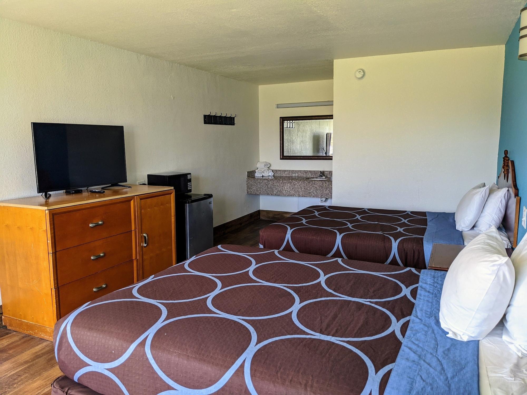 Habitación Garden Inn & Suites