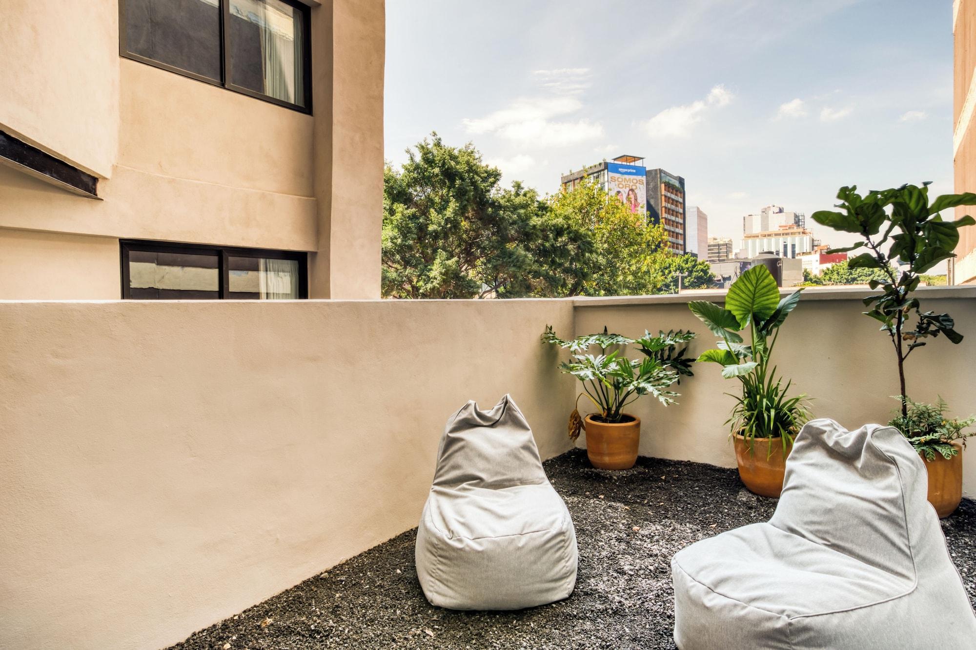 Bar/Salón Caliza Roma Residences by Tasman