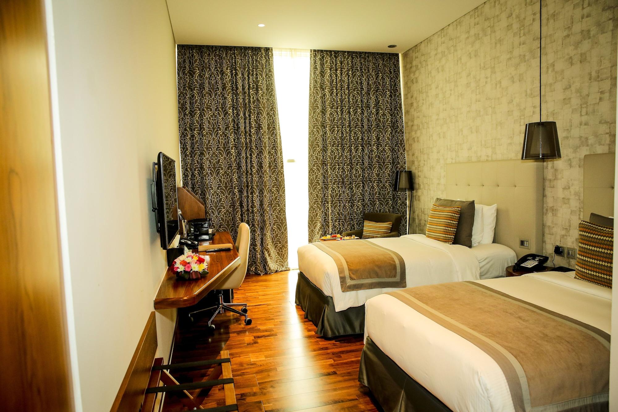 Habitación The Avenue Hotel