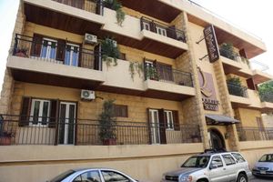 Alojamiento - Quartier Suisse Hotel