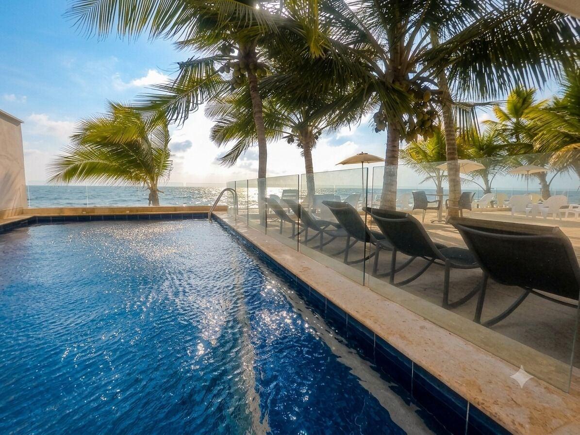 Vista Piscina CASA DANAE By HOTEL RILUX