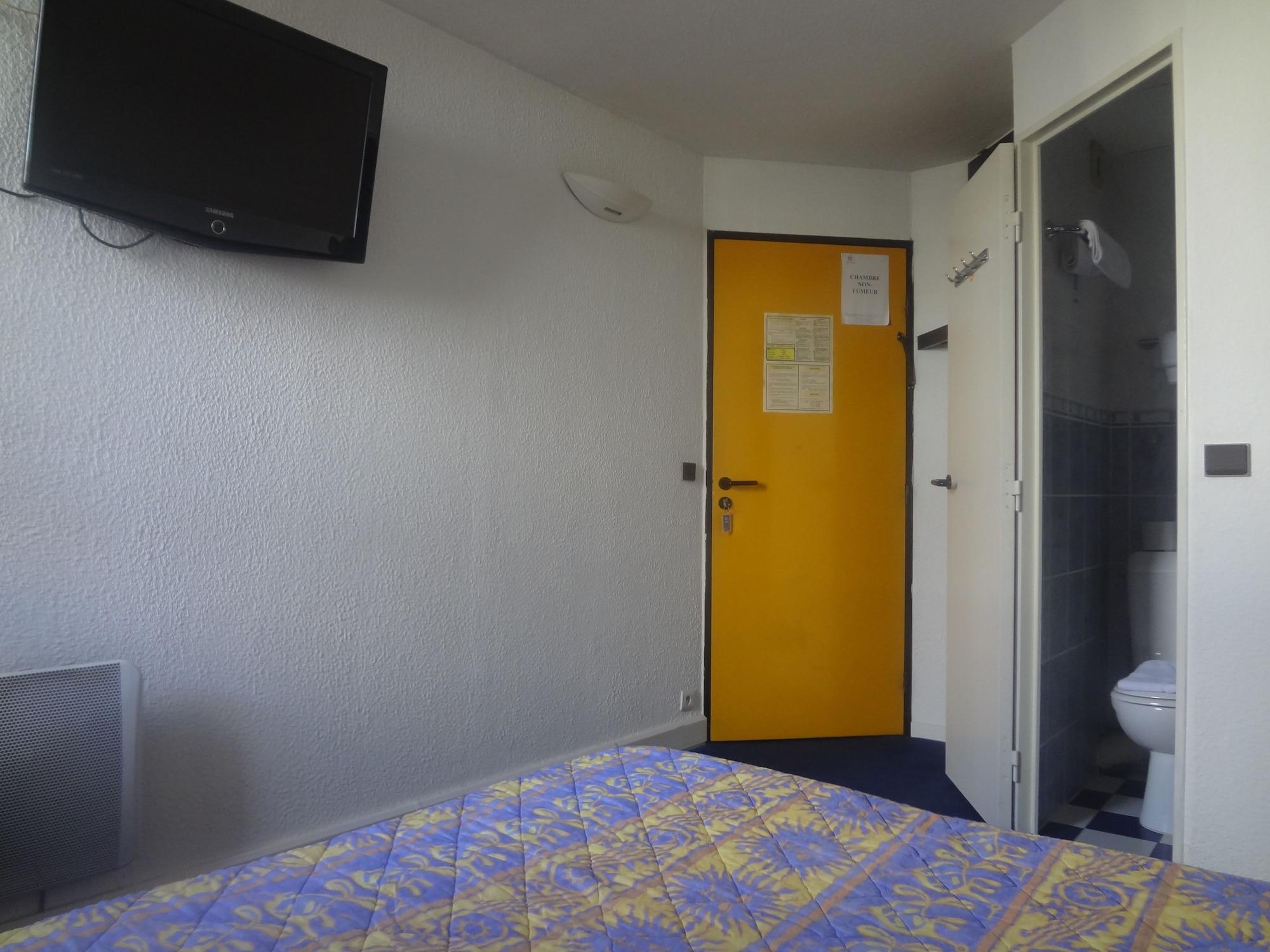 Habitación Rev'Hotel Coignières