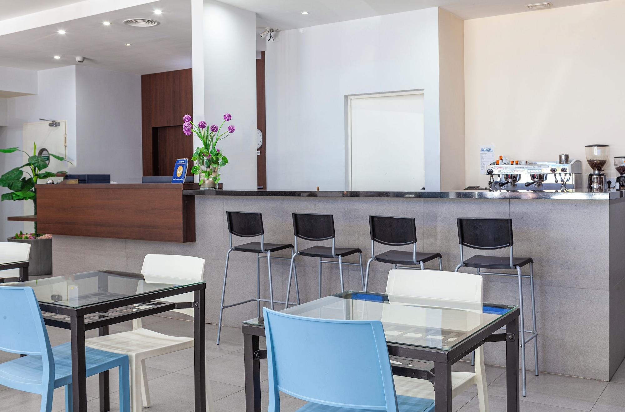 Bar/Salón Hotel Olympia Universidades