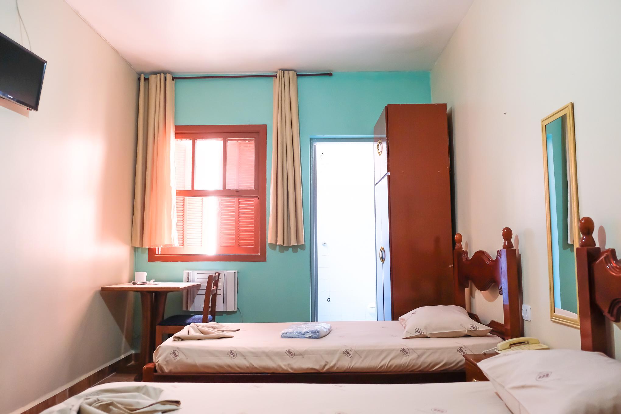 Habitación New Comercial Palace Hotel