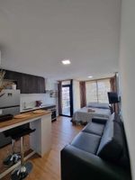 Alquiler Vacacional - A modern loft with a smart key system, located close to a Mall and beaches.