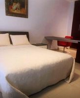 Alquiler Vacacional - Modern loft-style, 2 level apartment  with city views, cover parking and pool.