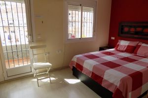 Alquiler Vacacional - Two bedroom Town house with basement, aircon, communal pool, wifi and sea views