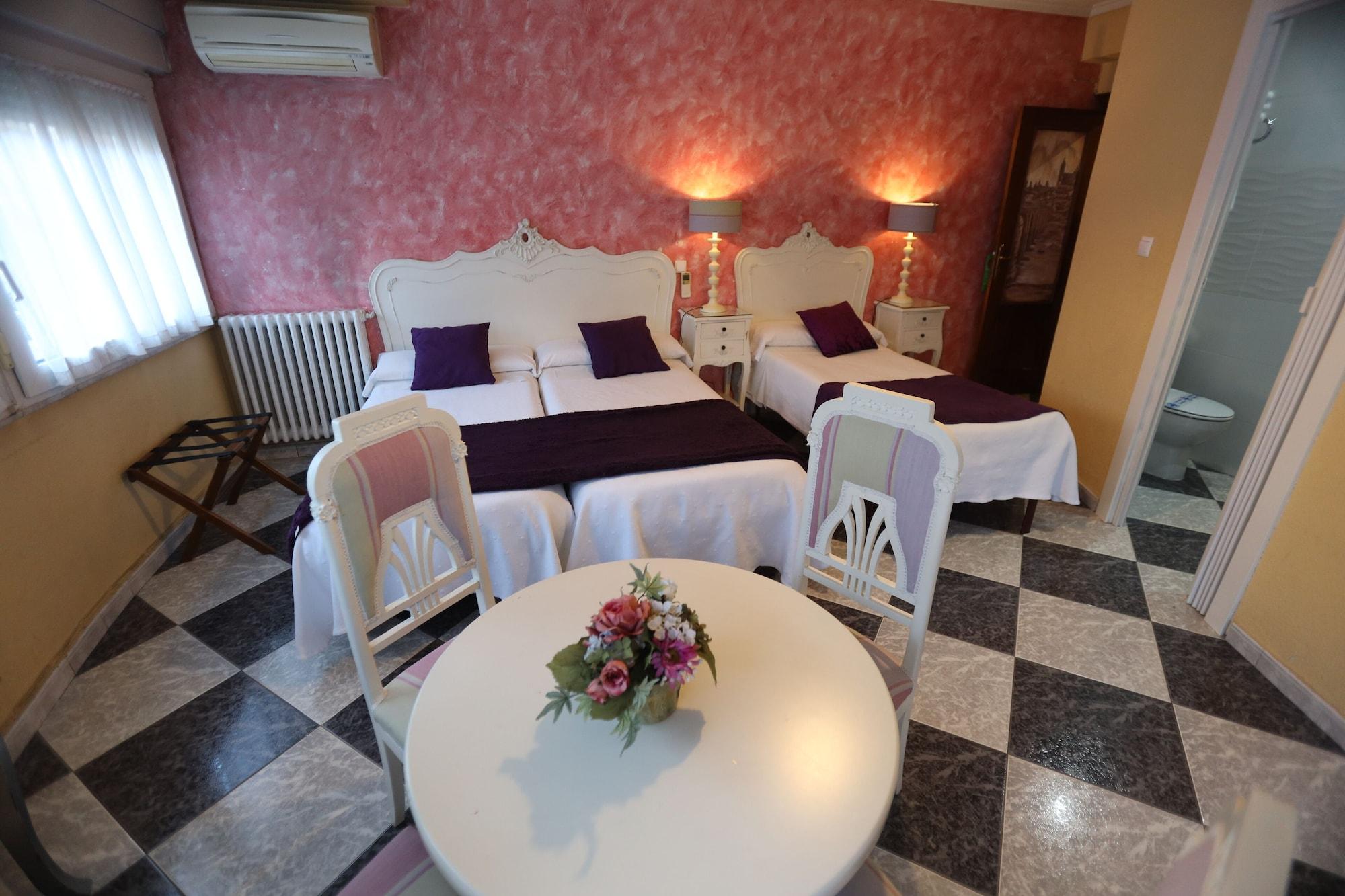 Habitación Hostal Goya Suites