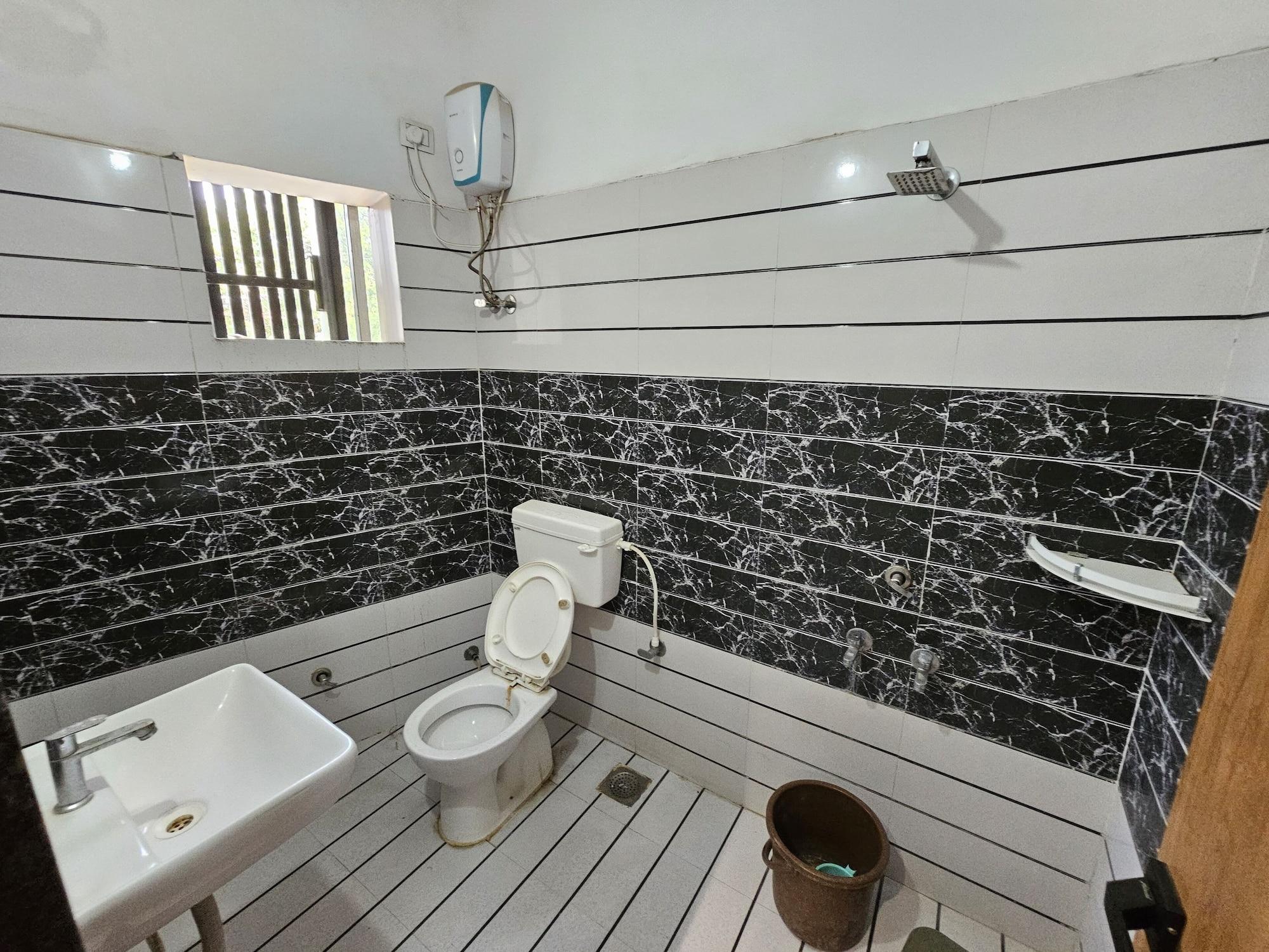 Equipamiento de Habitación StayGuru Hotel Paradise Inn