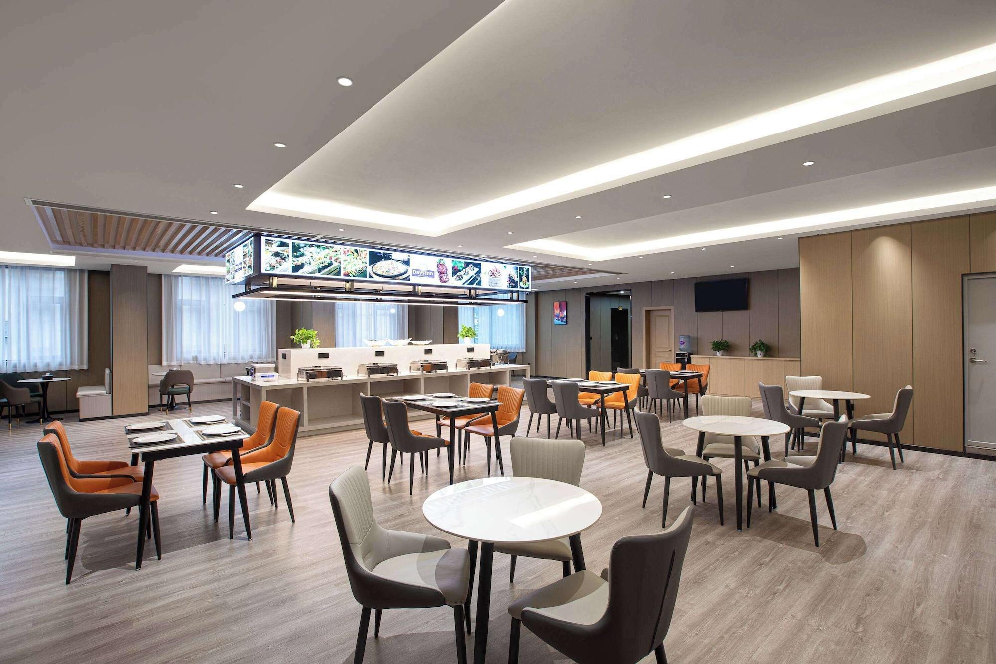 Restaurant Days Inn By Wyndham Zunyi Conference Site