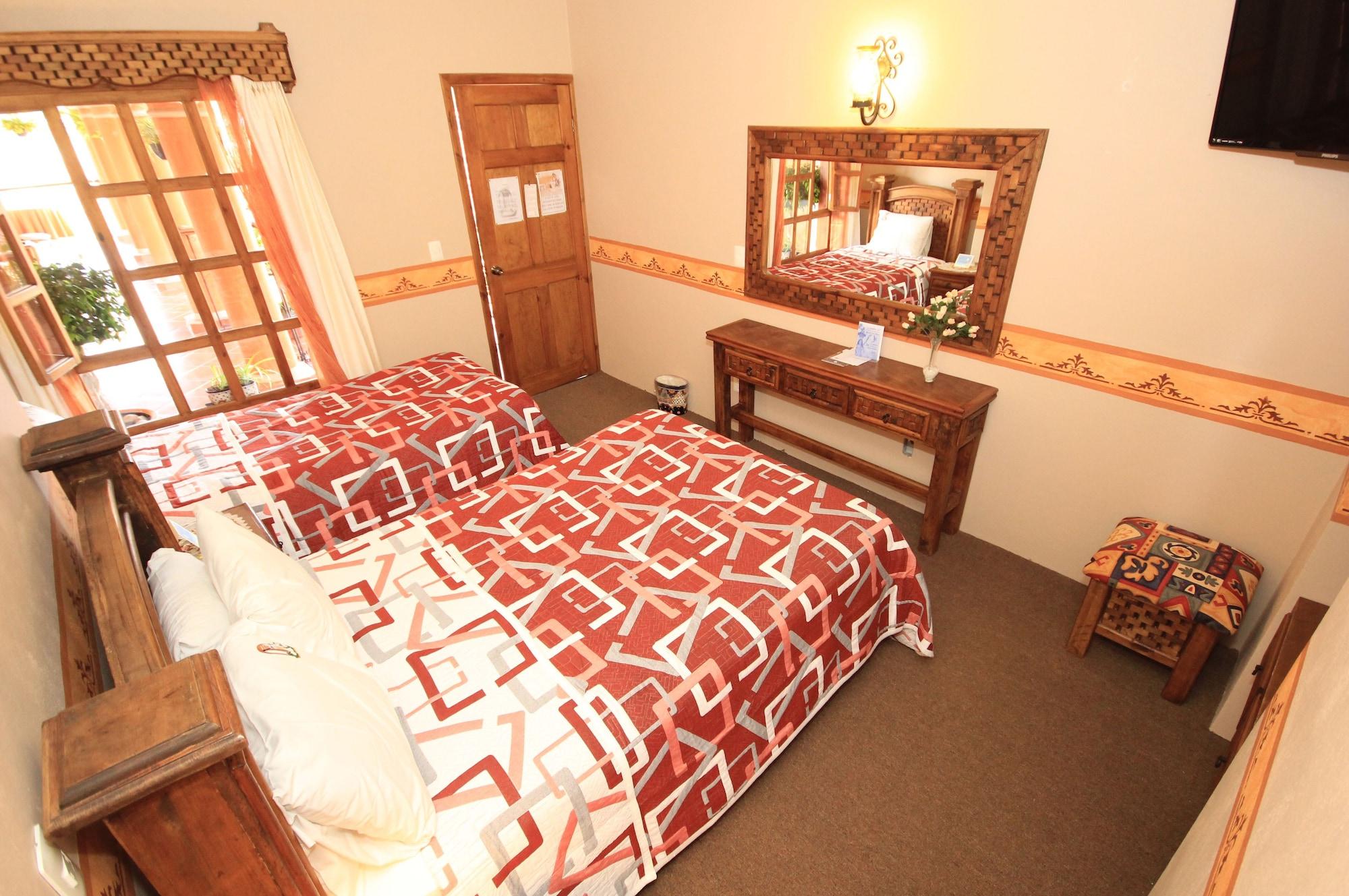 Habitación Hotel La Casa de Mama