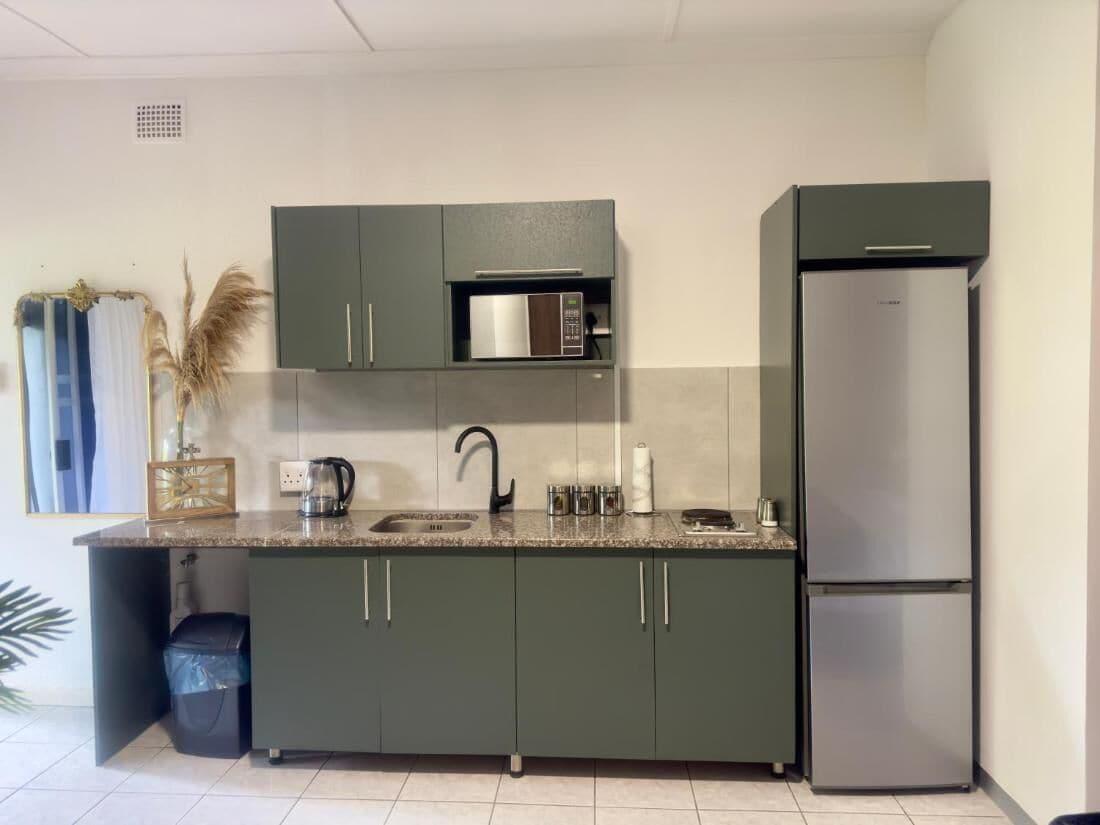 Comodidades del Alojamiento Room-busa House Self-catering Guest Hous