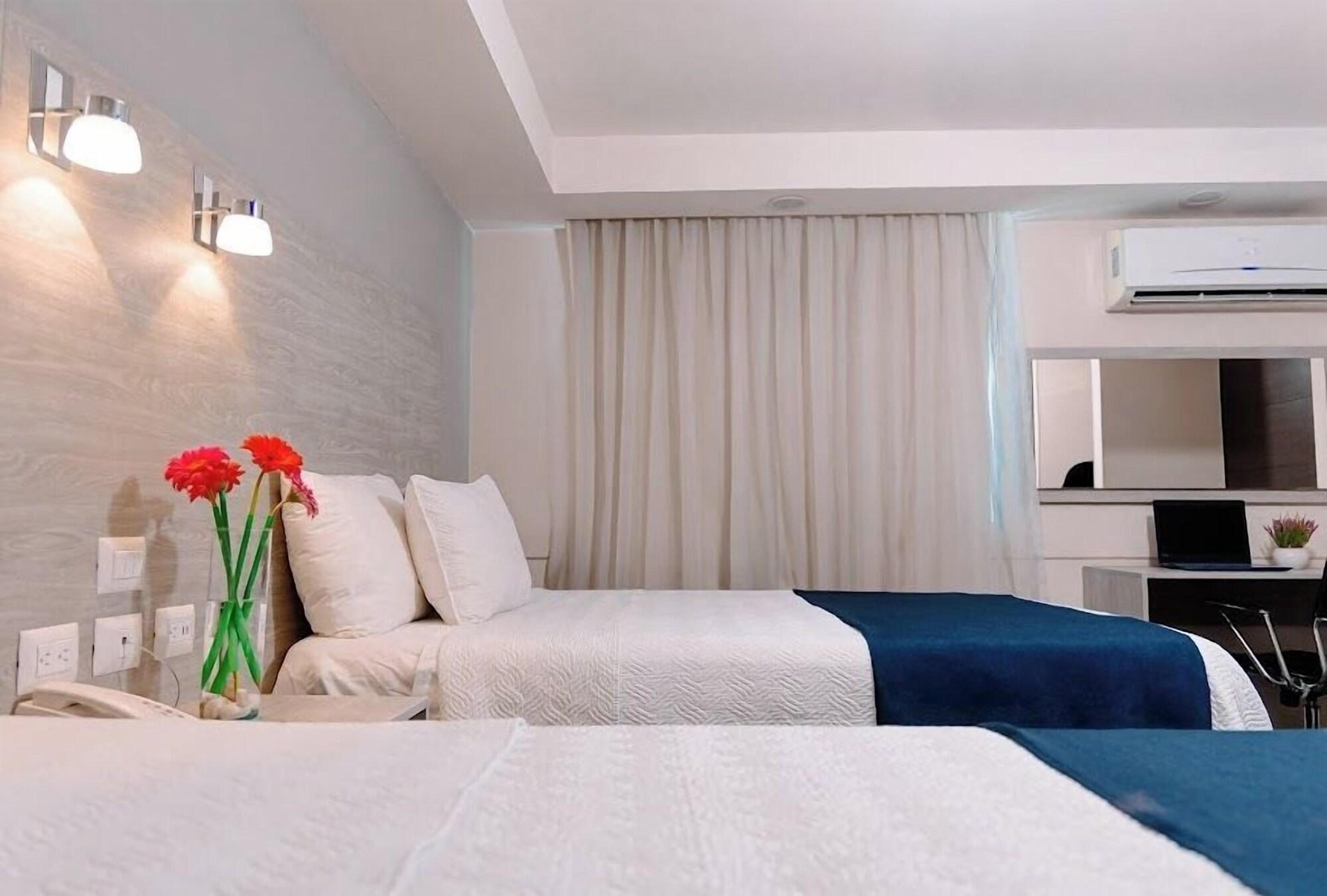 Habitación Kasa Hotel & Suites