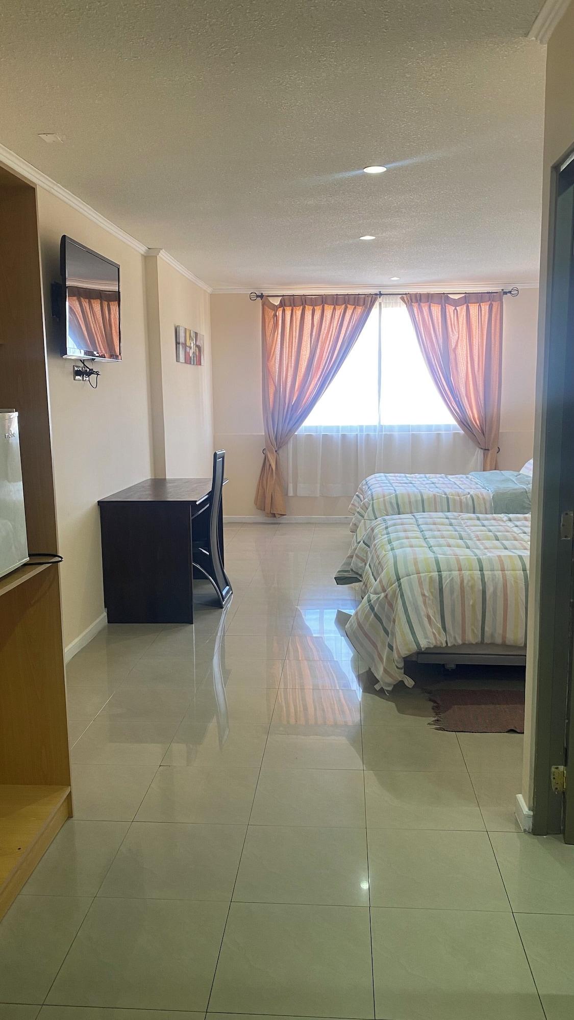 Habitación Hotel Astore Suites