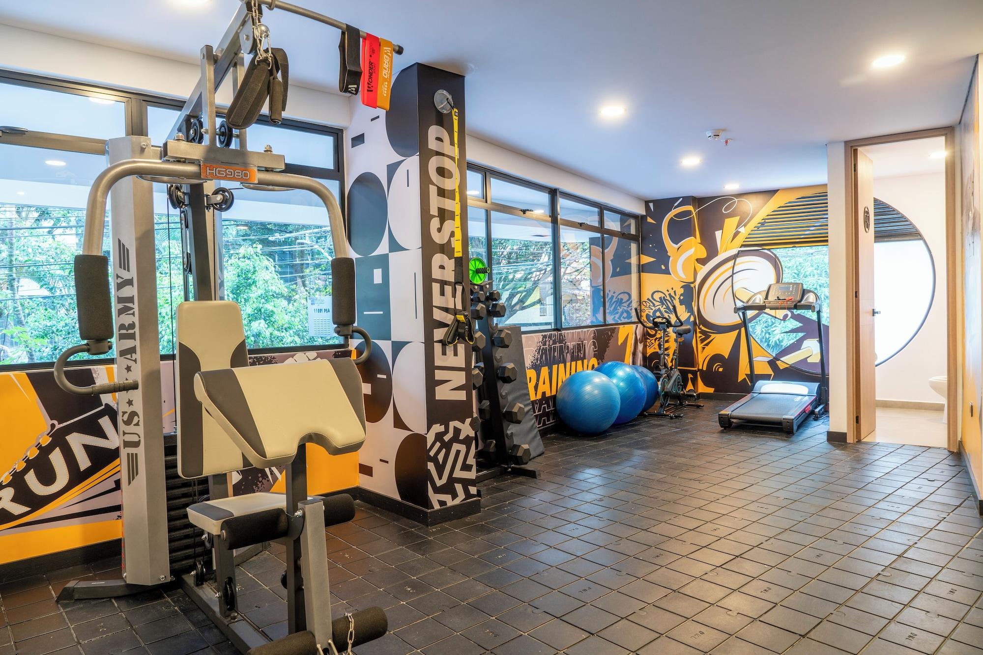 Gimnasio Hotel Living 35 Suites by Growing Group