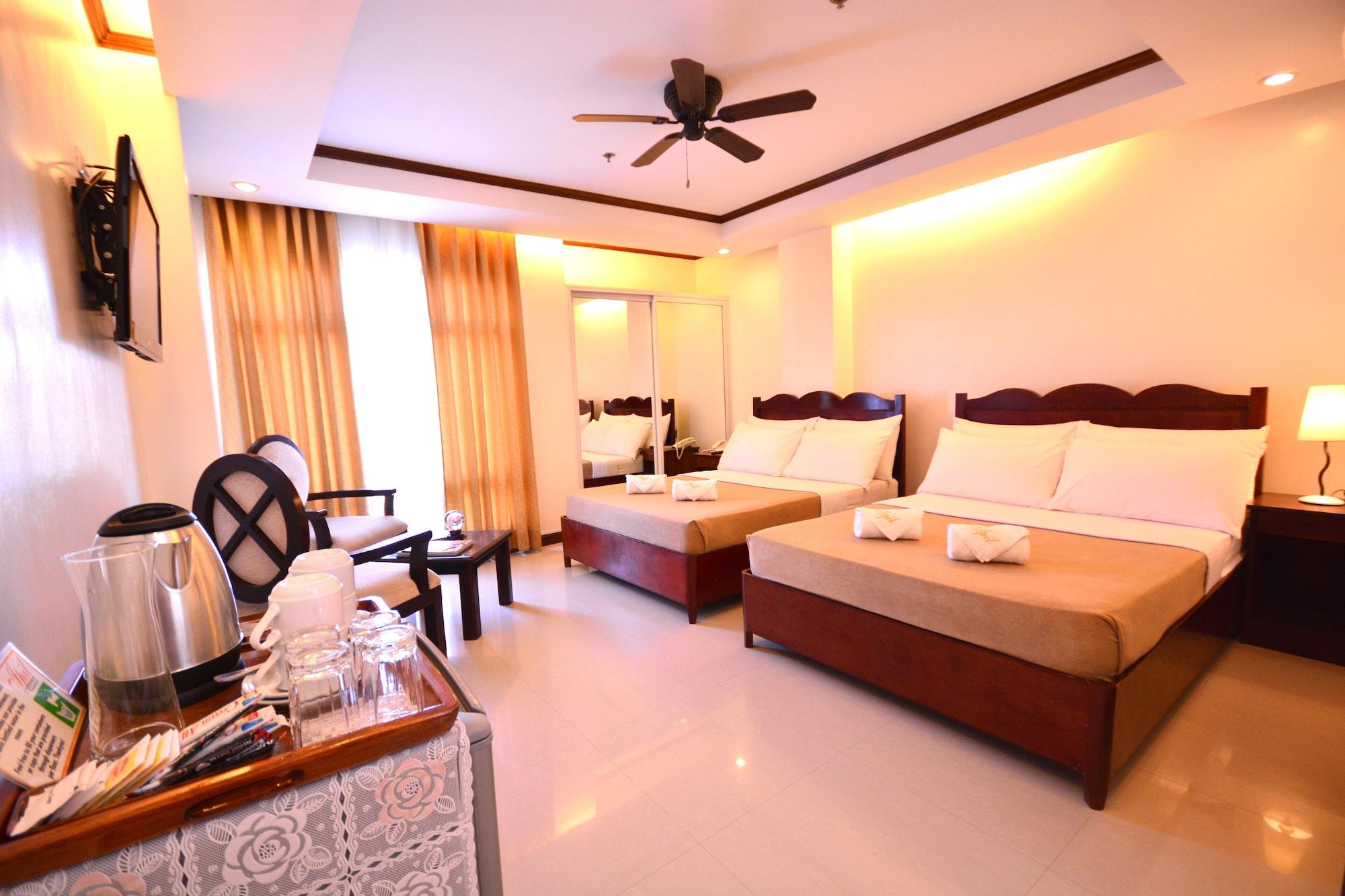 Habitación Ipil Suites Puerto Princesa