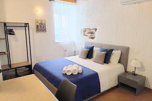 Alojamiento - HOLMANN SUITE ROOMS