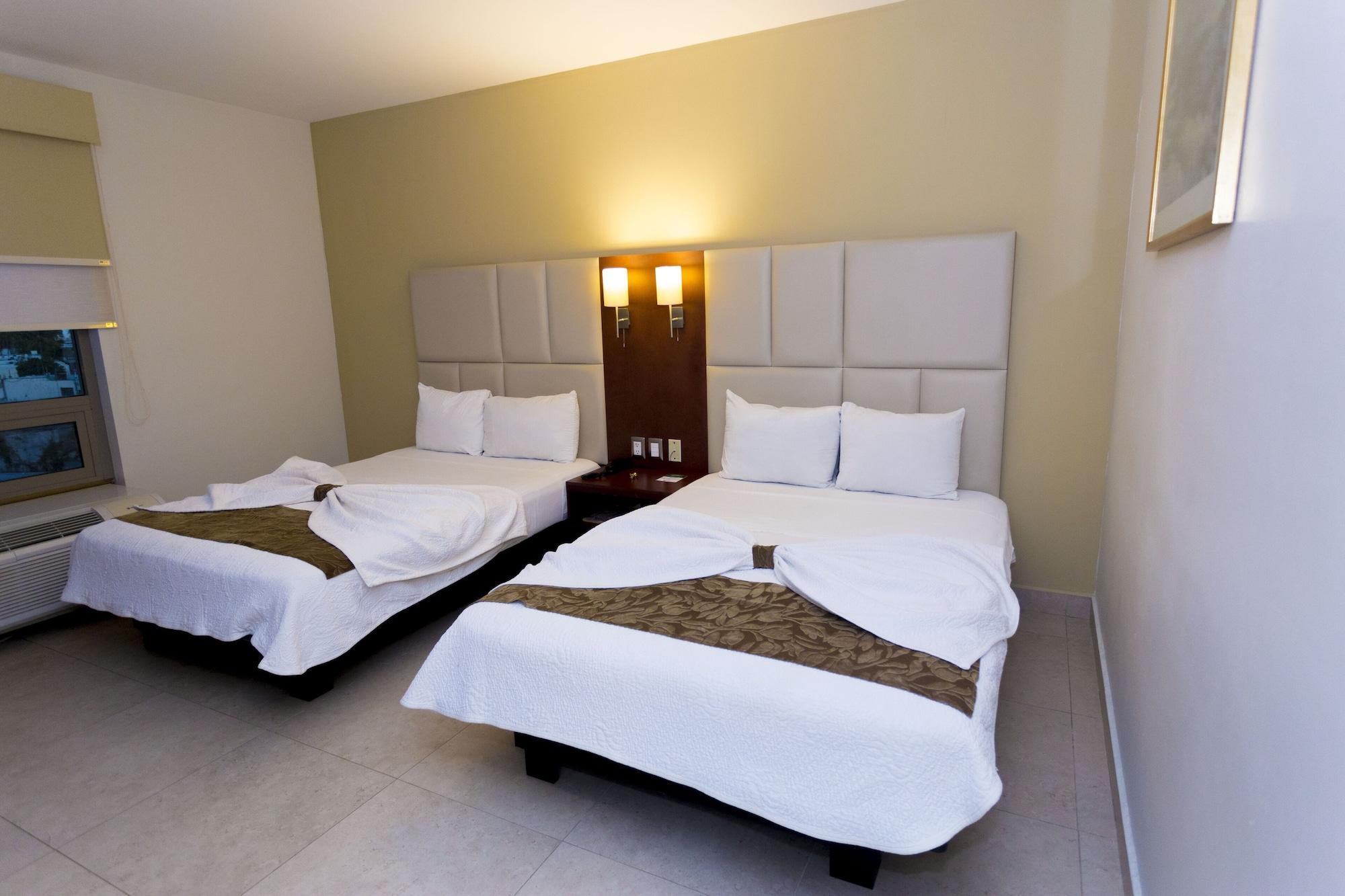 Habitación Ave Inn Hotel