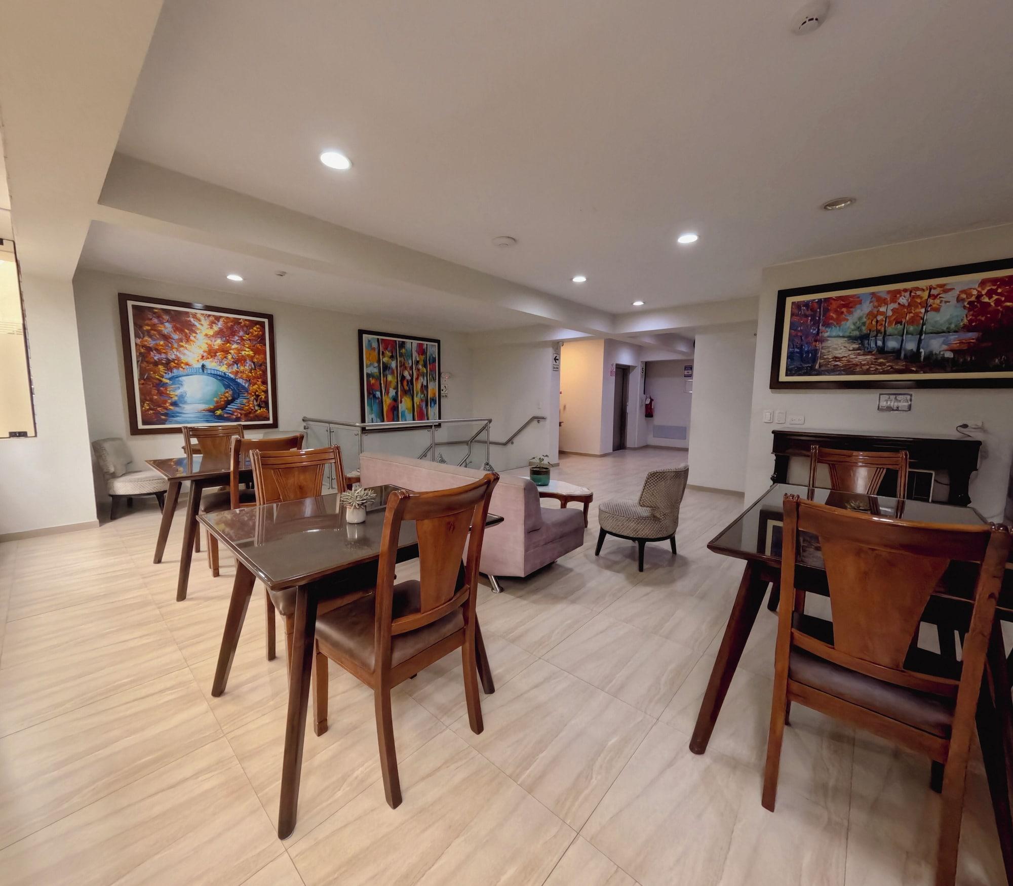 Vista do lobby Hotel Esencia Suites