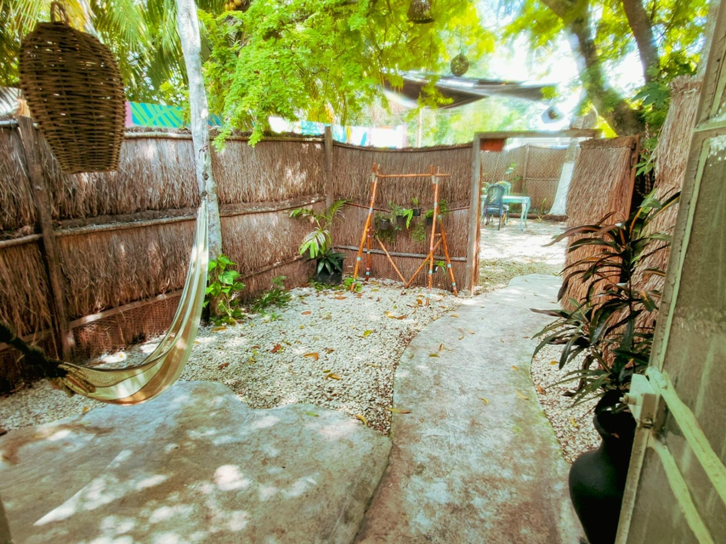 Balcón, patio o terraza Casa Arte Garden Bacalar - Free Bikes