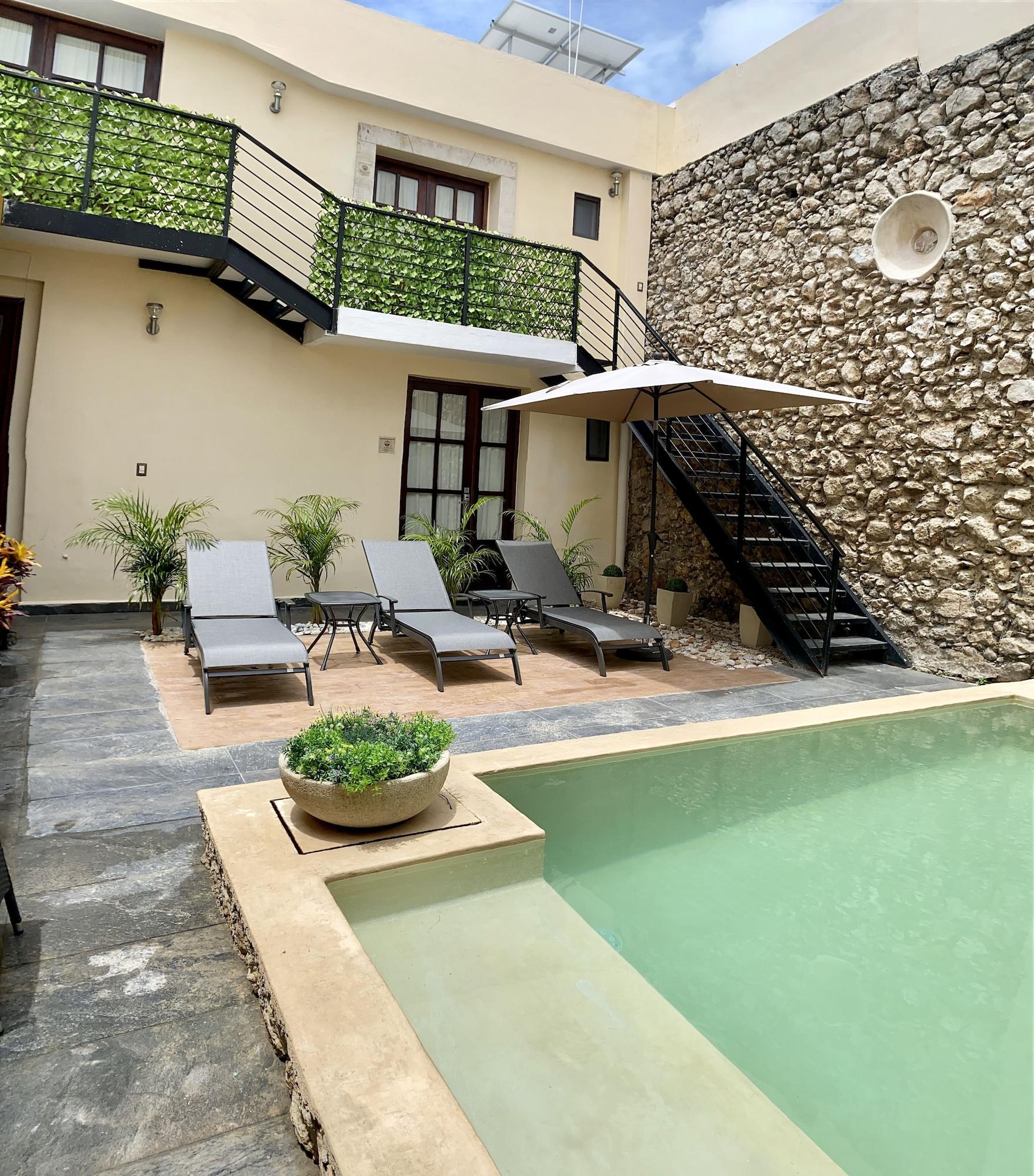 Comodidades del Alojamiento Kuxtal Hotel Boutique