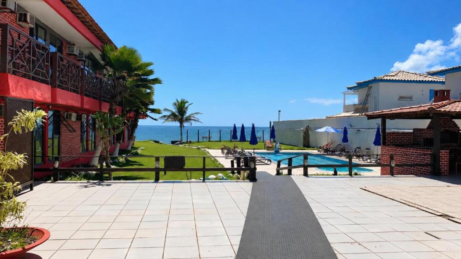 Vista da piscina HANNA Búzios Al Mare Hotel