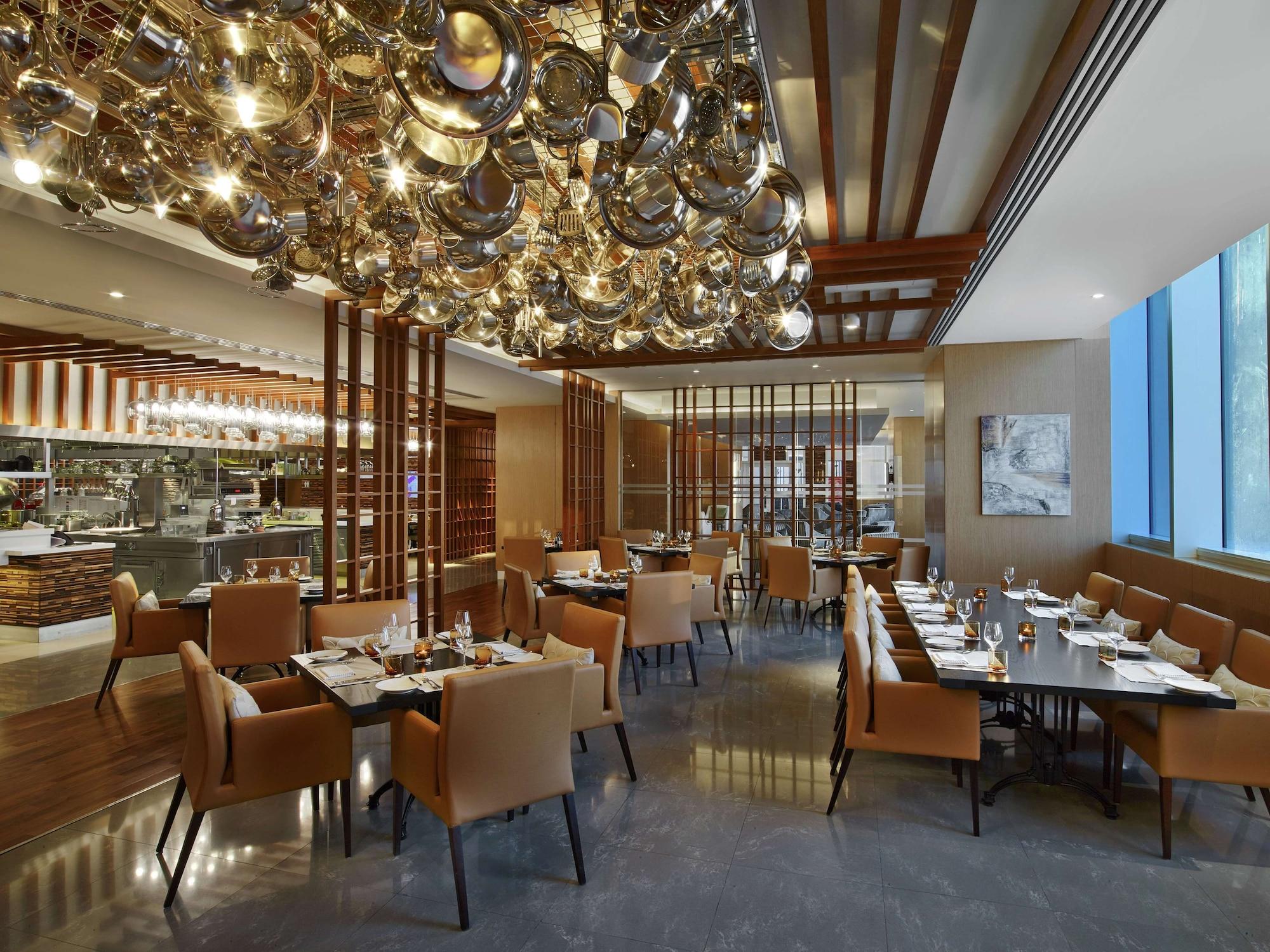 Restaurant V Hotel Dubai, Curio Collection by Hilton