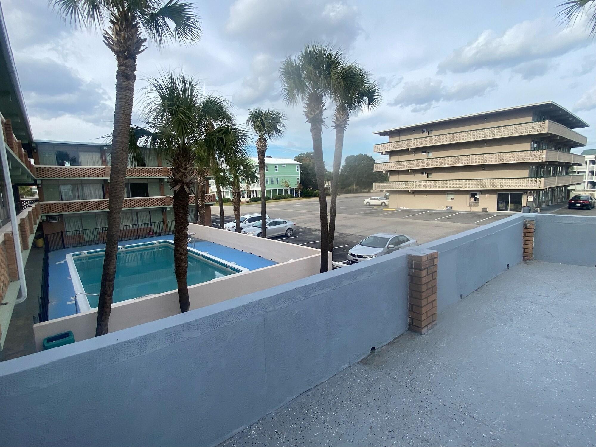 Vista Exterior Palms by the Beach Motel