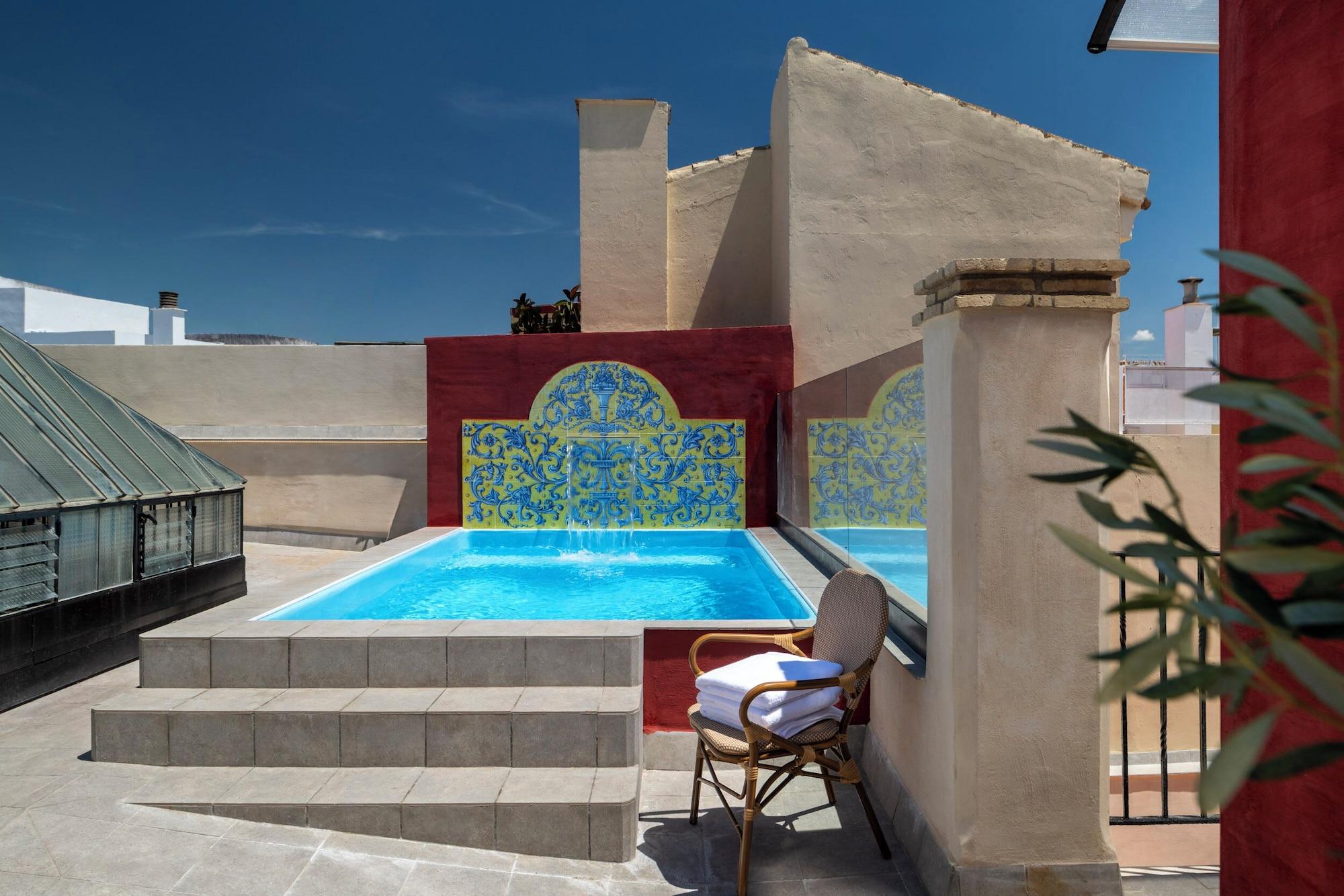Vista Piscina Casa Palacio Moratín by Magno Apartments