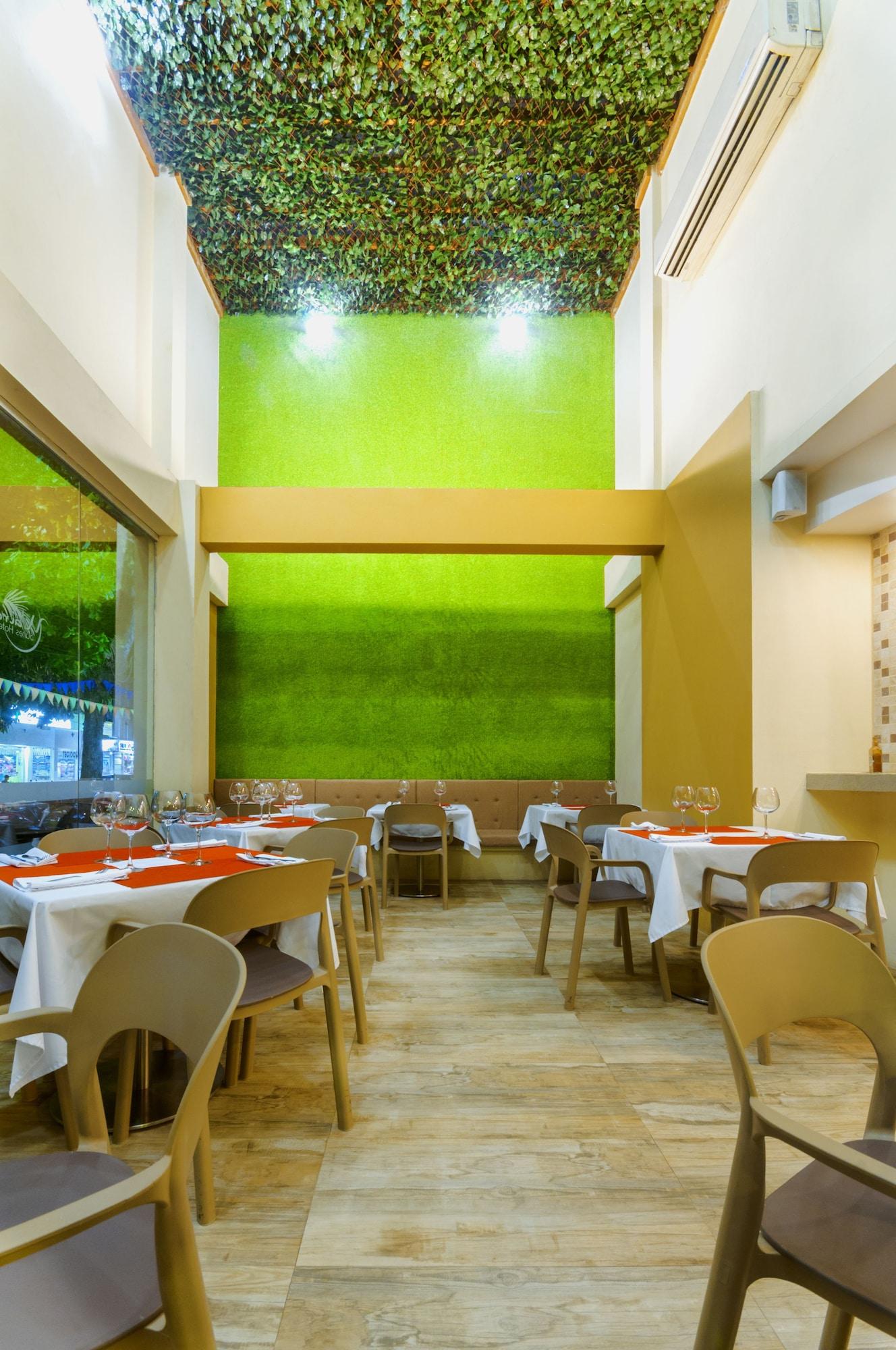 Restaurant Waira Suites Hotel
