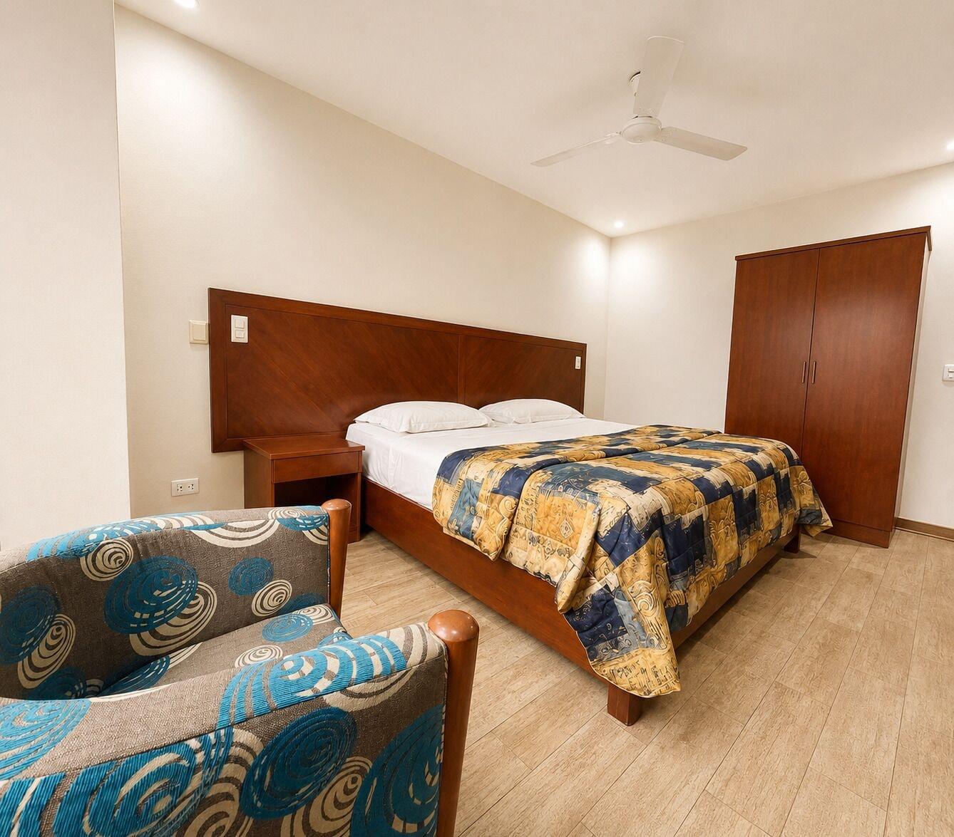 Quarto Hotel Esencia Suites