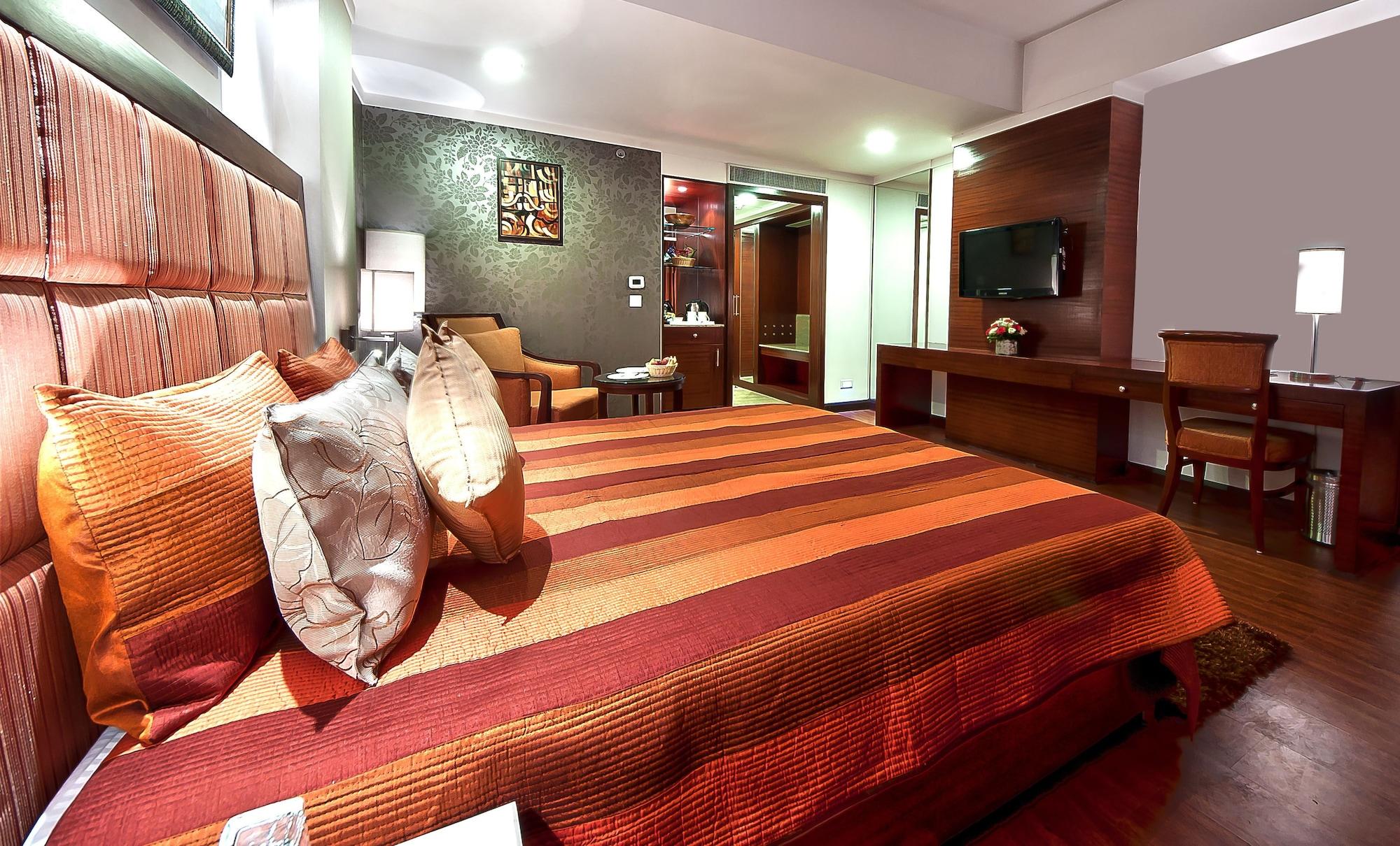 Habitación The Golden Plaza Hotel & Spa