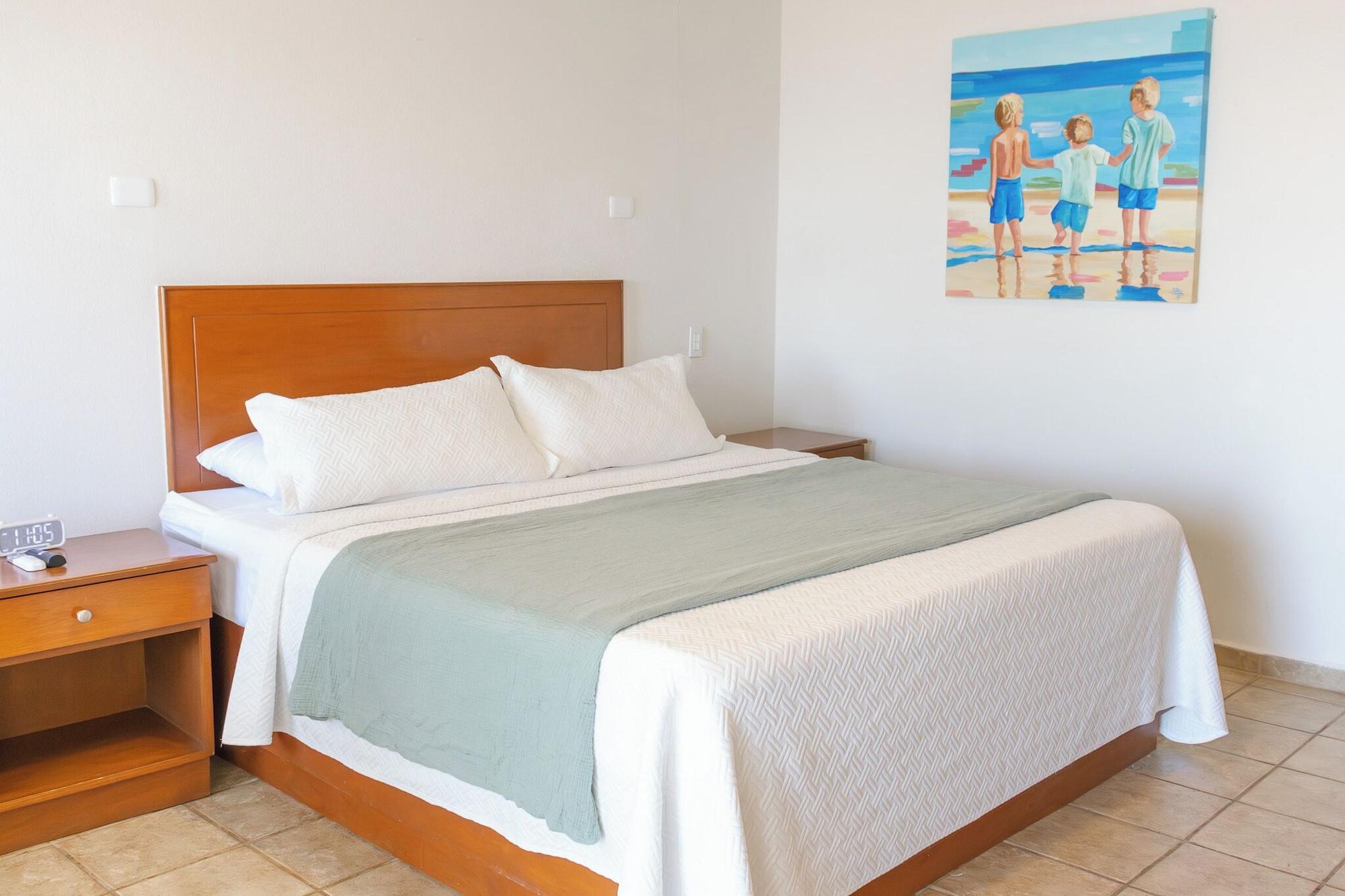 Habitación Costa Elegante Hotel & Suites