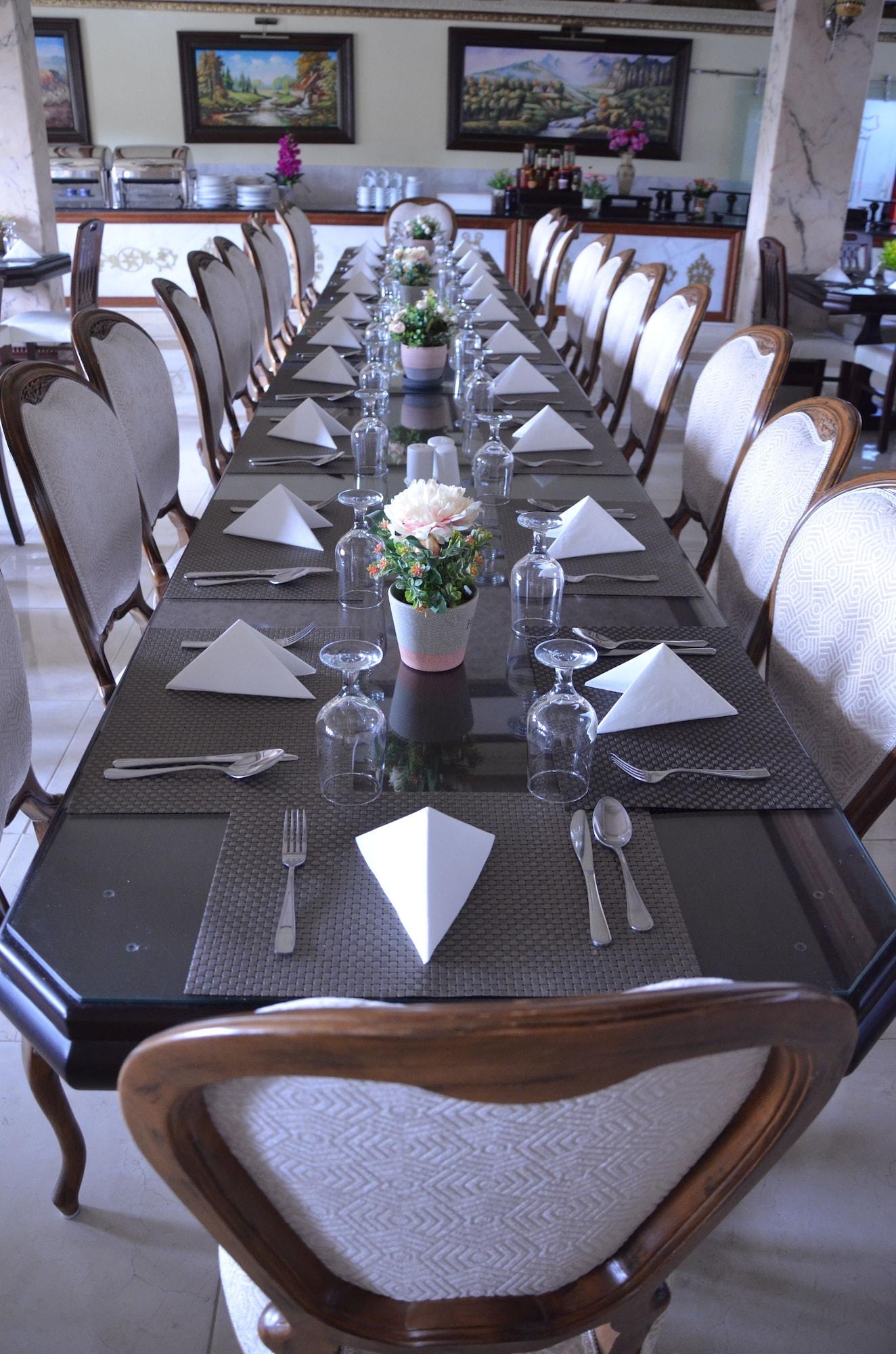 Restaurant Amra Palace International Hotel